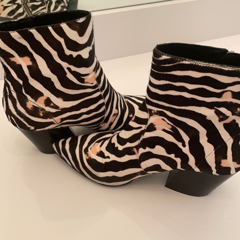 All Saints Zebra striped with pink touches.